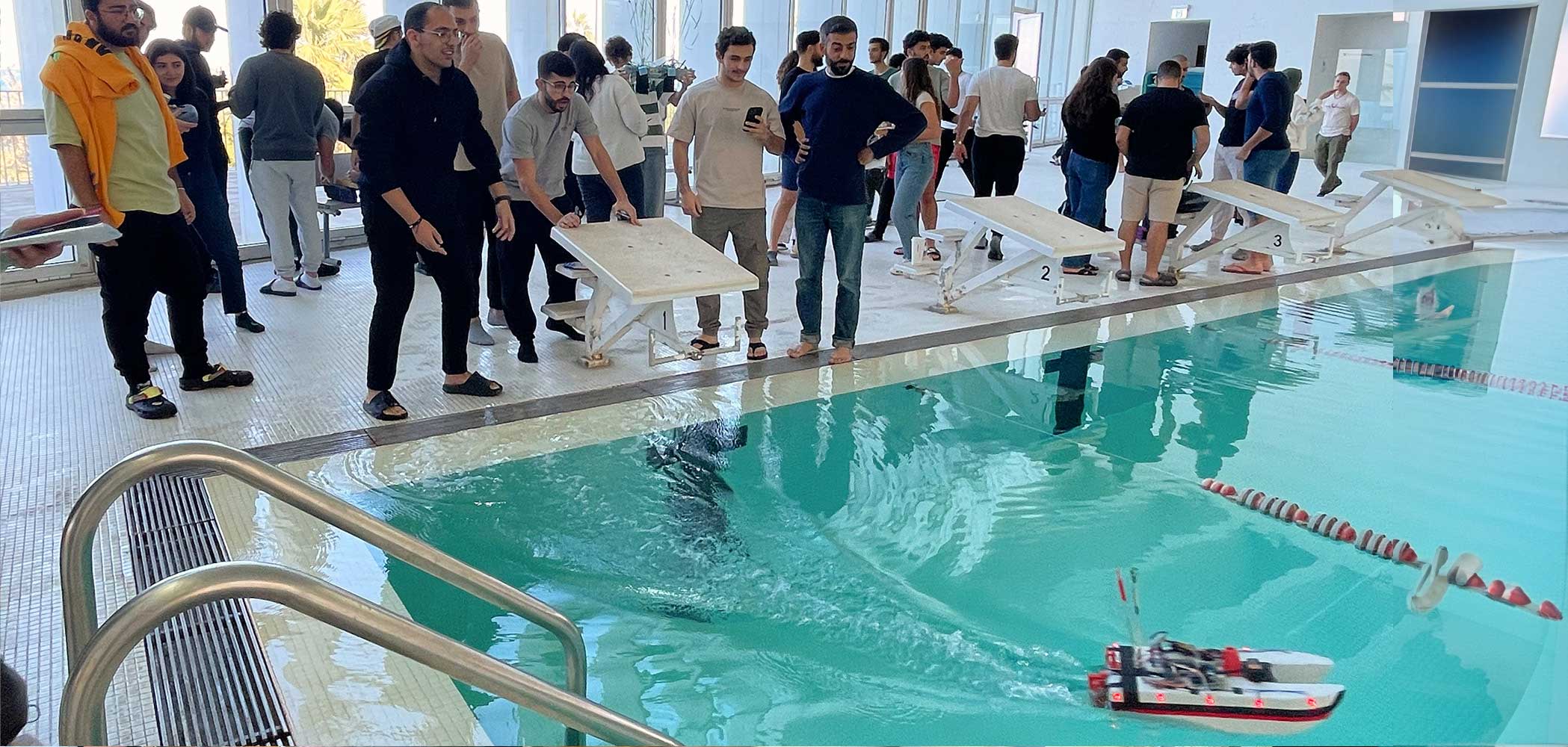 This isn’t just any class presentation,it’s a high-stakes competition in MECH 421, the Manufacturing Processes course. Students build speed boats using composite materials, putting theory into practice and competing to see whose boat can sail.