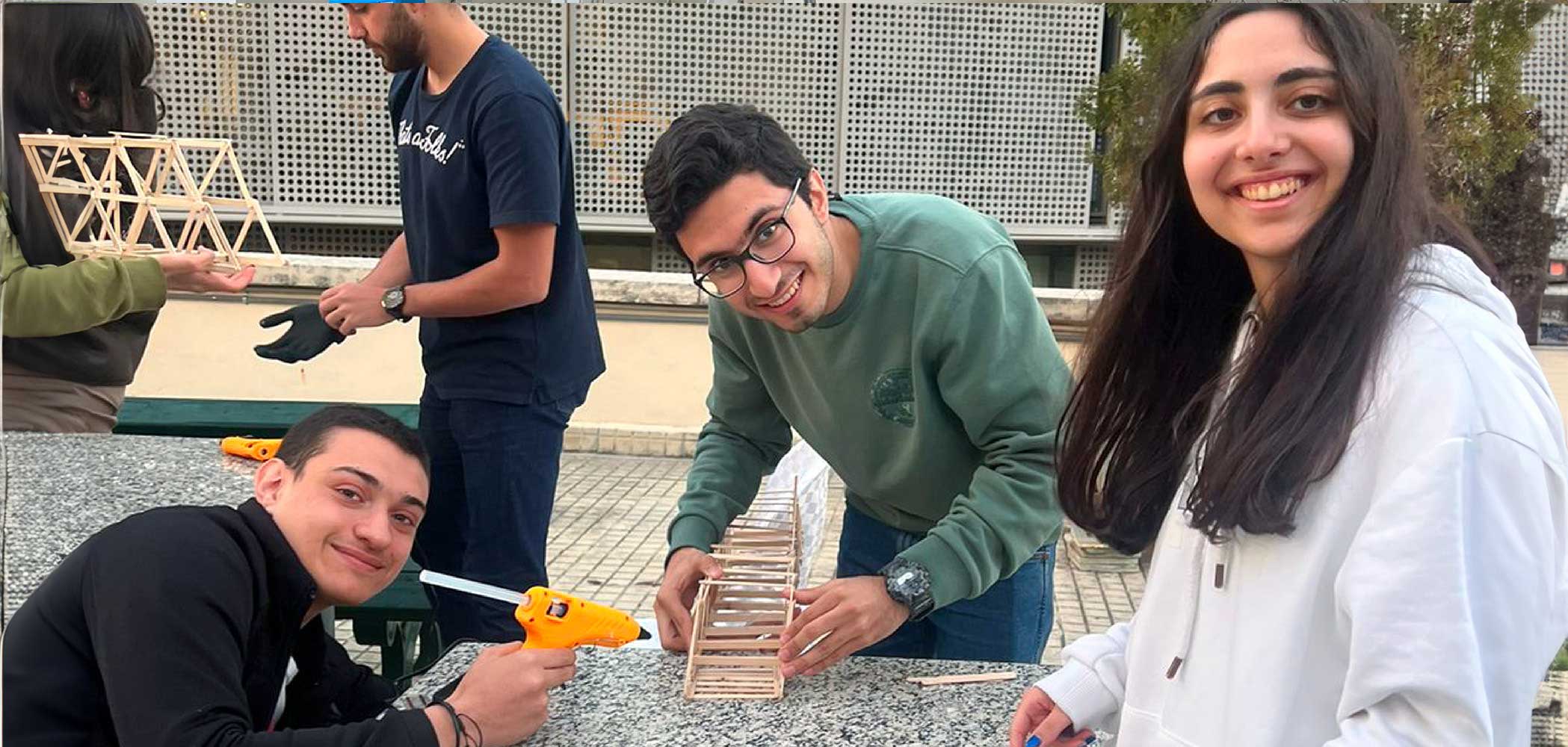 Students take learning into their own hands by organizing competitions that bring together different majors. Through collaborative projects like building the steadier bridge, they apply their knowledge in practical scenarios